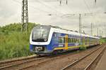 Am 20.6.2011 fhrt ET 440 220 als RB31 nach Moers in Rheinhausen ein.