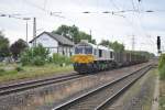 DB Schenker Rail Deutschland AG/150860/am-1872011-zieht-247-020-1-einen Am 18.7.2011 zieht 247 020-1 einen Gterzug durch Ratingen-Lintorf.