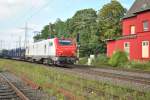 Am 17.8.2011 zieht E 37 519 einen Gterzug durch Ratingen-Lintorf.